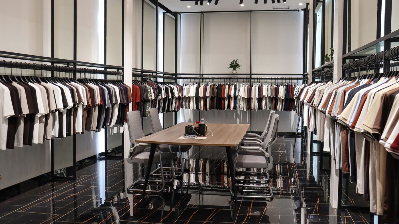 Racks of men's jackets at the SAZ Atelier showroom, apM Times International